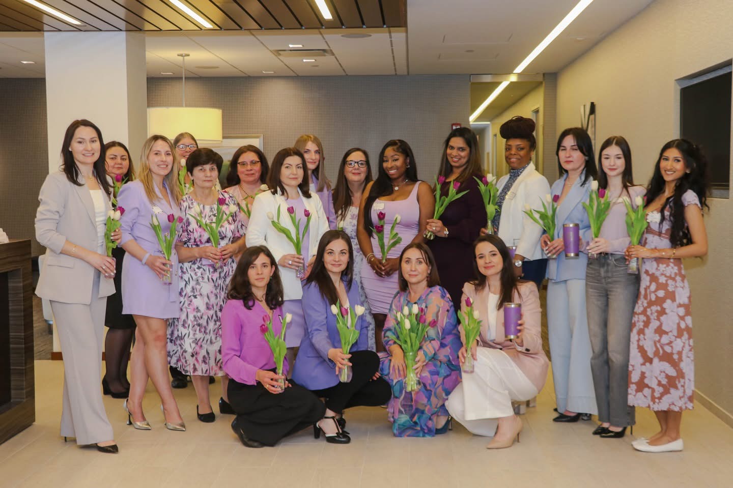 Empowered Woman Club event group with tulips
